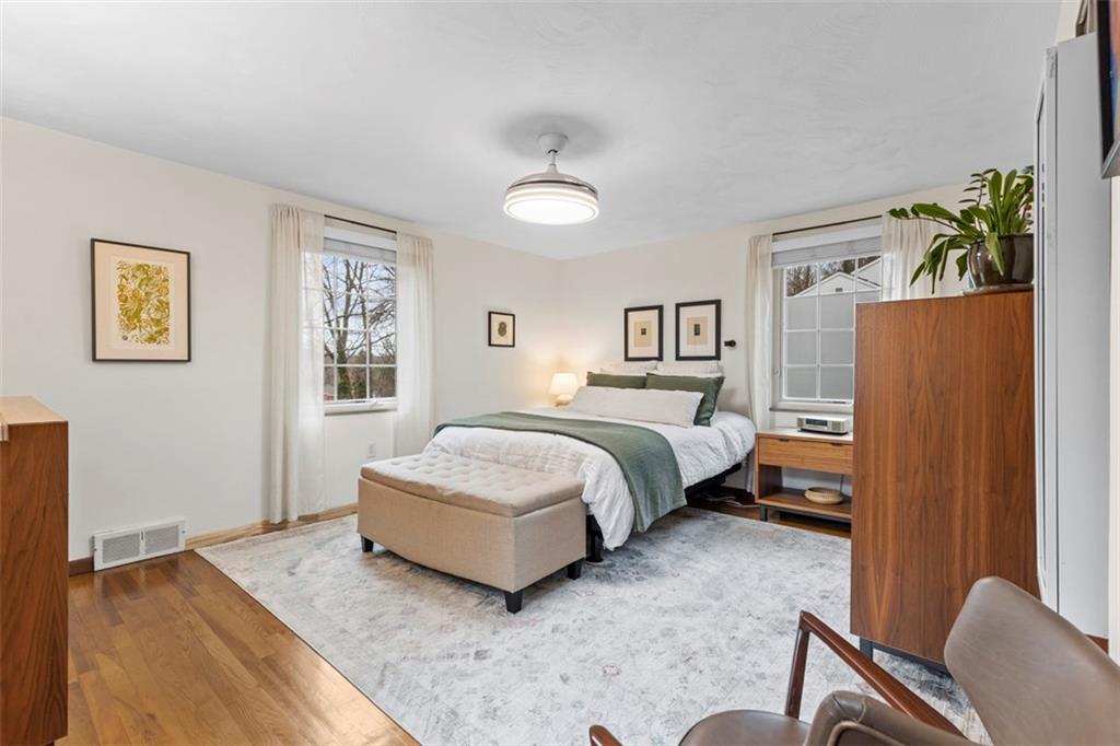 85 Lambeth Drive Pittsburgh, PA 15241 - Photo 25 of 47 a bedroom with a bed lamp and a window