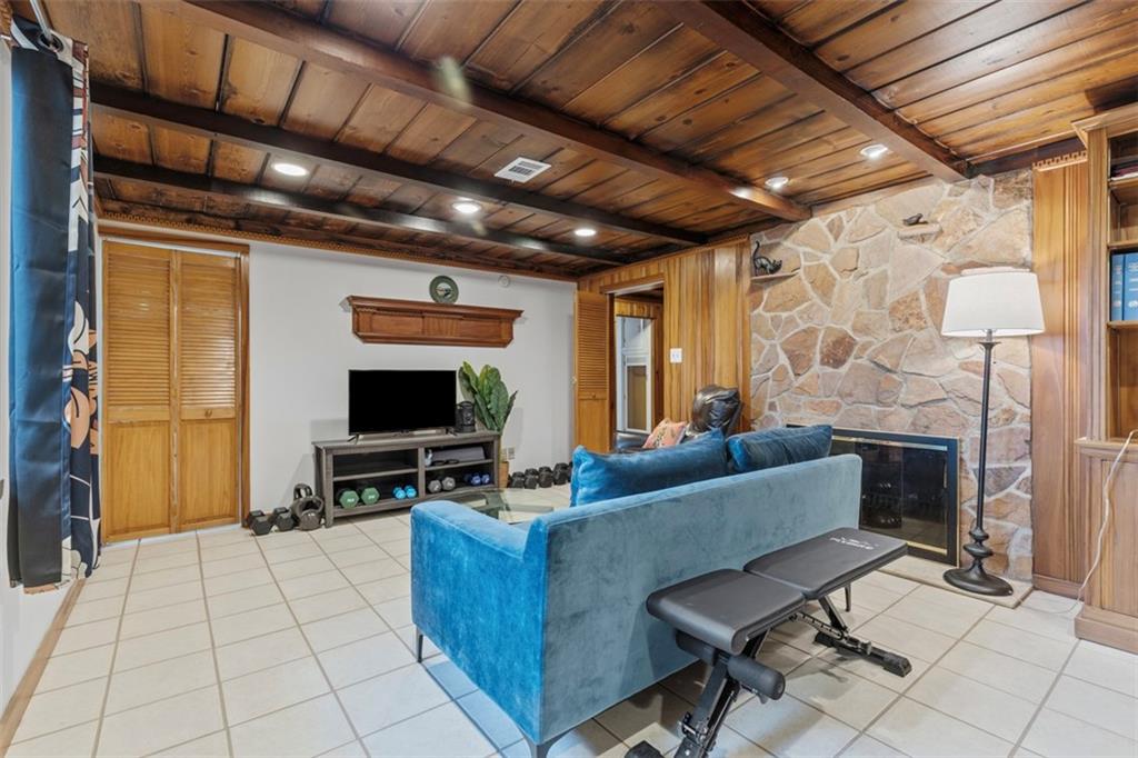 85 Lambeth Drive Pittsburgh, PA 15241 - Photo 33 of 47 a living room with fireplace furniture and a flat screen tv