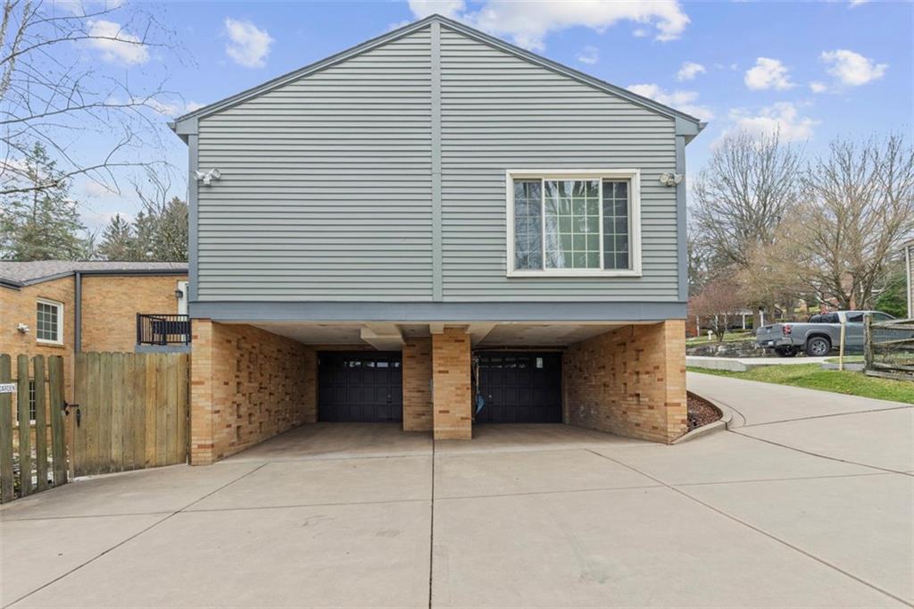 85 Lambeth Drive Pittsburgh, PA 15241 - Photo 41 of 47 a front view of a house with a garage