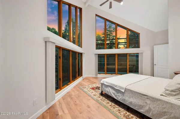 a room with furniture and a flat screen tv