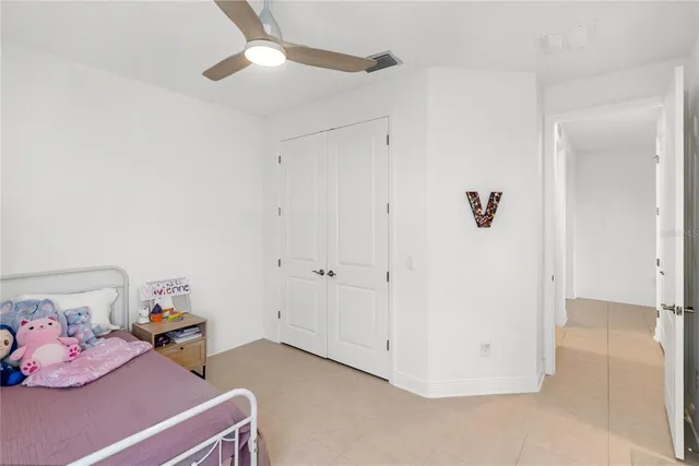 an aerial view of a house with a yard lake view and mountain view