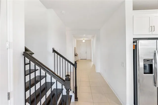 a kitchen with stainless steel appliances kitchen island granite countertop a sink and cabinets