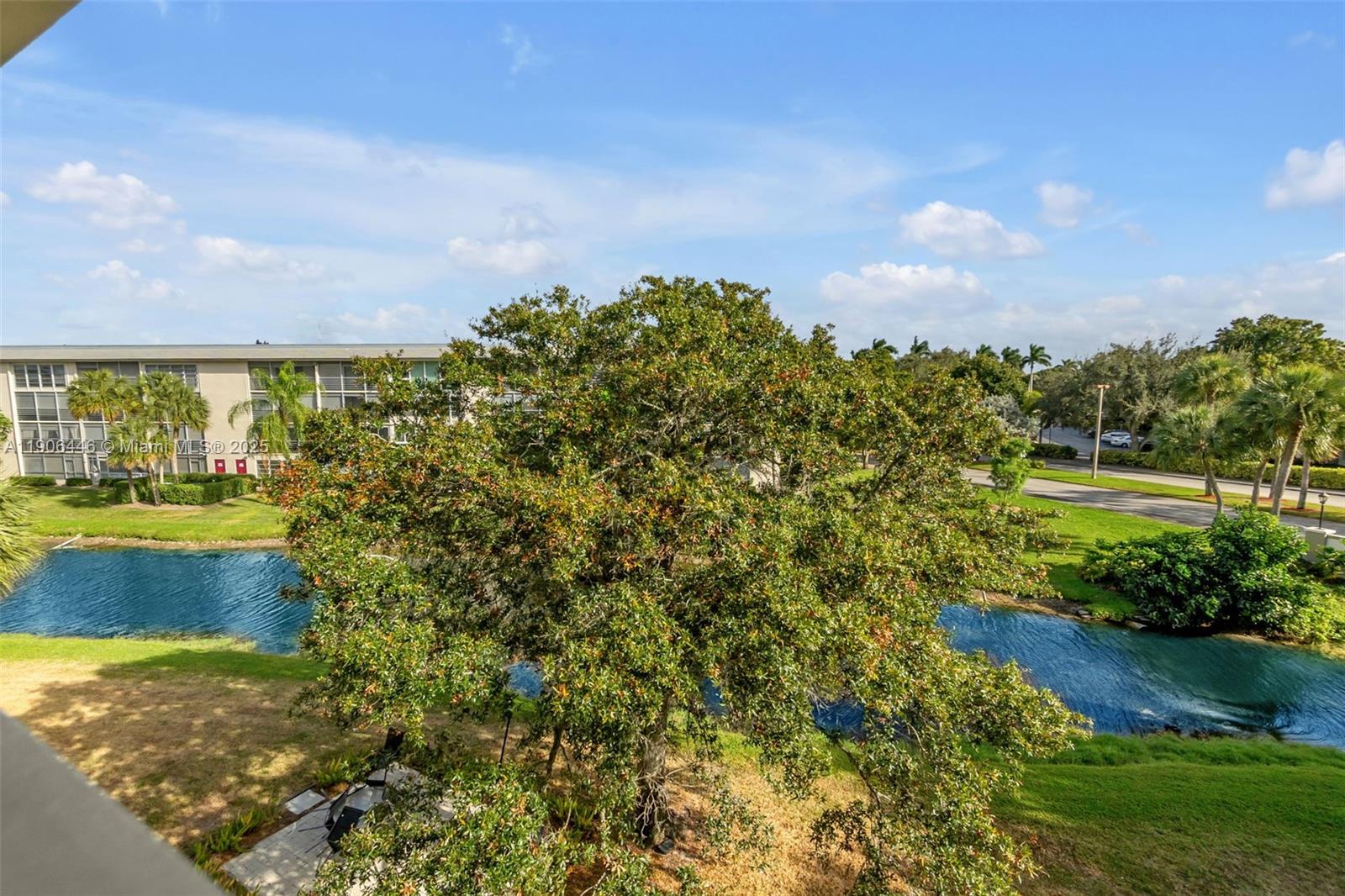 4401 Martinique Court, Unit C4 Coconut Creek, FL 33066 - Photo 3 of 26 a view of a garden