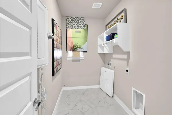 a view of hallway with furniture and a window