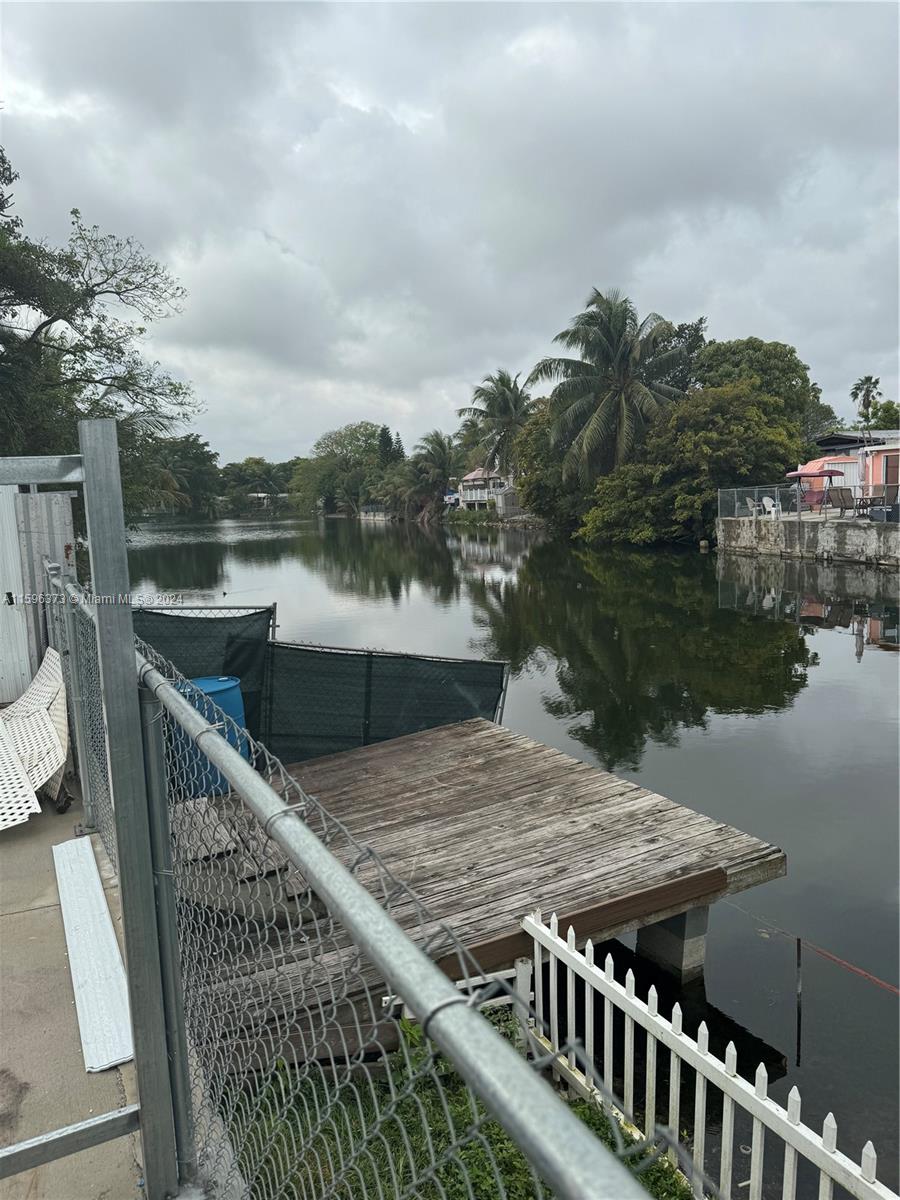 1432 Southwest 129th Court, Unit 2 Miami, FL 33184 - Photo 1 of 12 a view of a terrace with sky view