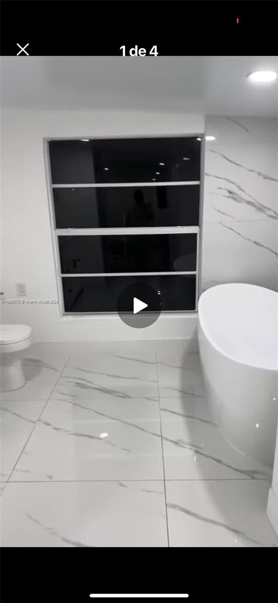 1432 Southwest 129th Court, Unit 2 Miami, FL 33184 - Photo 6 of 12 a view of walk in closet
