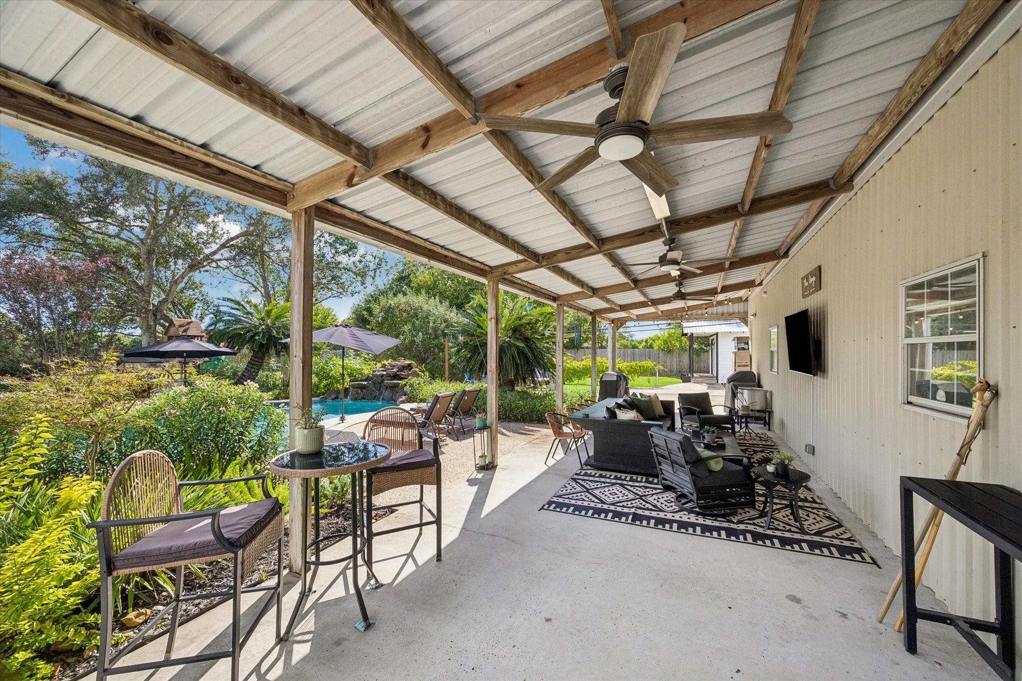 12806 Britt Road Pearland, TX 77581 - Photo 21 of 33 Huge covered area great for entertaining or for additional storage of equipment.