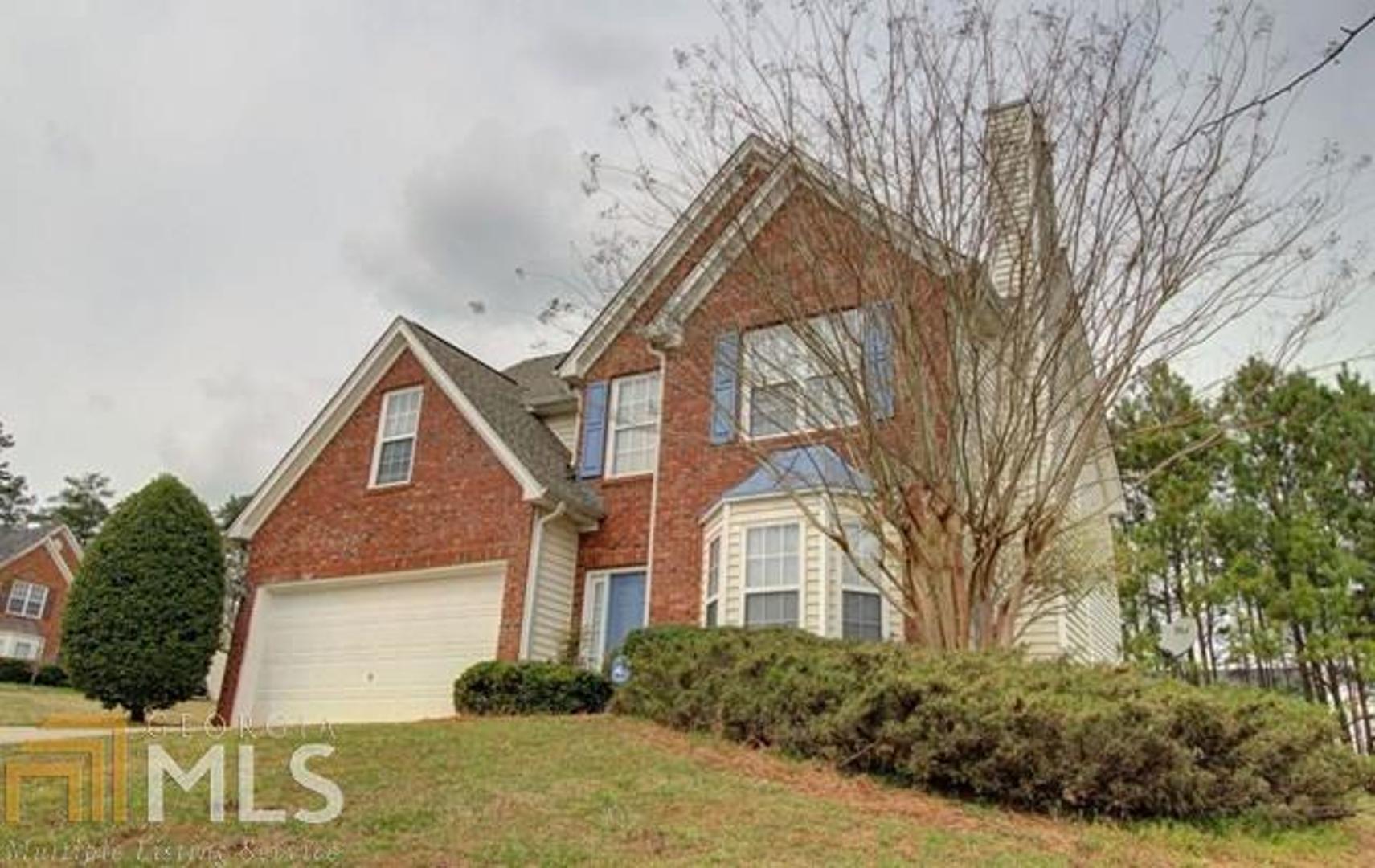 3410 Jessica Run Decatur, GA 30034 - Photo 1 of 1 a front view of a house with garden