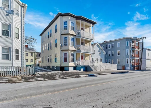 a view of a building with a street