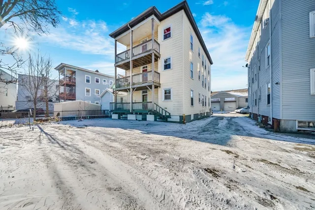 a view of a street in front of a building
