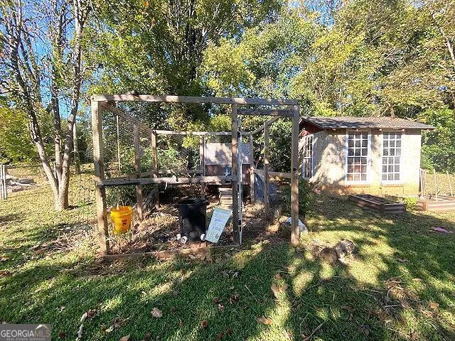 a view of outdoor space yard and blue trees