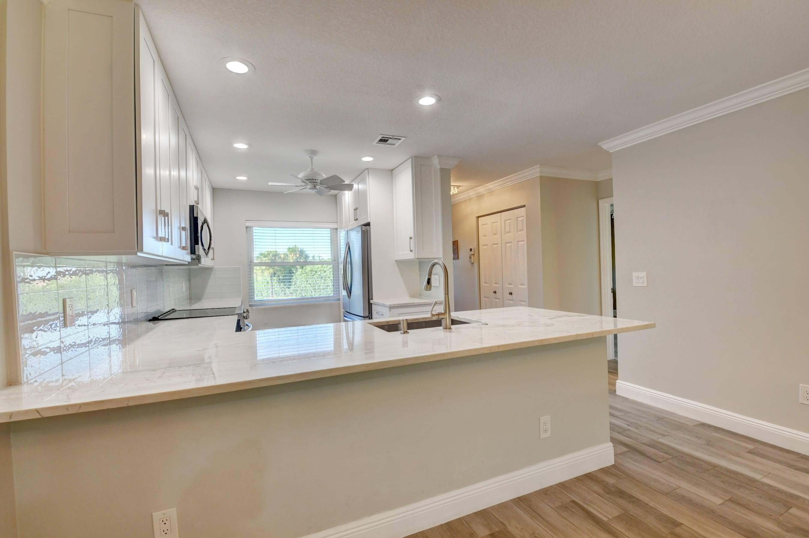 21848 Arriba Real, Unit 7D Boca Raton, FL 33433 - Photo 6 of 44 Kitchen
