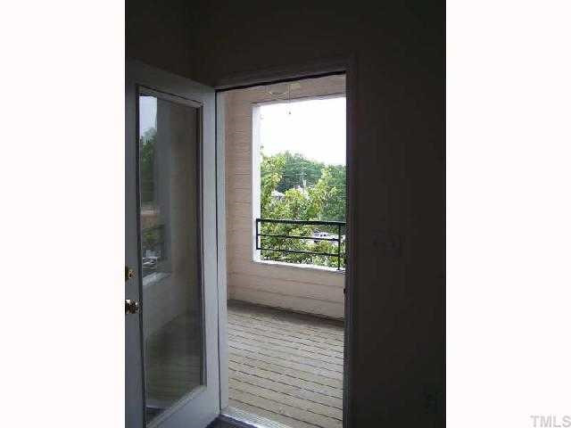 Covered porch off living room is perfect to just kick back and relax. Has a celing fan. Patio/Deck