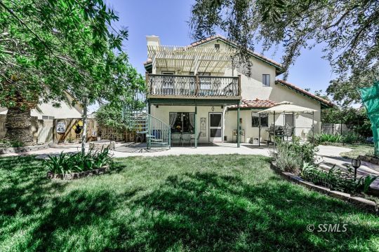 1213 Andrea Court Ridgecrest, CA 93555 - Photo 49 of 50 a view of a house with sitting area and garden