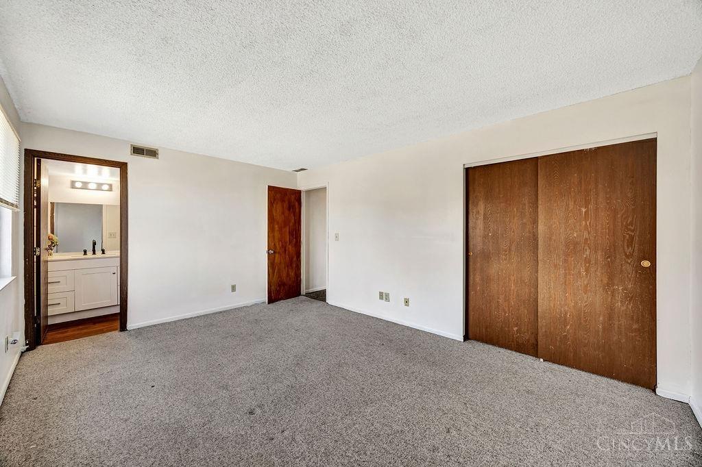 3944 Mack Road, Unit 27 Fairfield, OH 45014 - Photo 19 of 31 Spacious primary bedroom with ensuite bathroom.