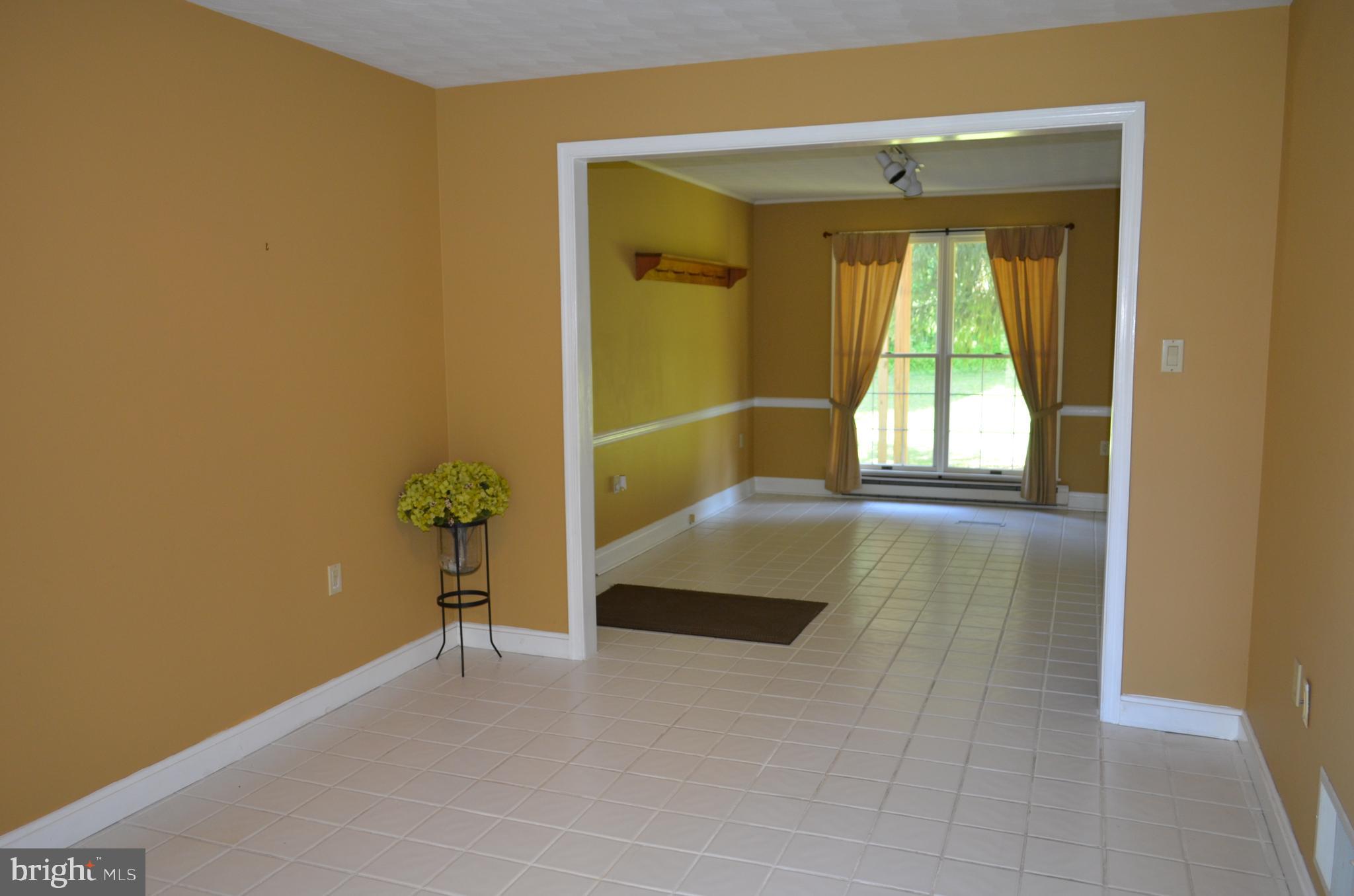 435 Big Spring Road New Cumberland, PA 17070 - Photo 15 of 79 Formal living room looking into dining room