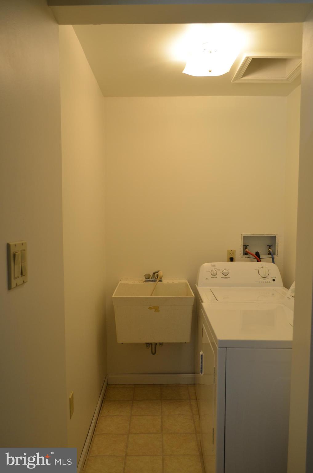 435 Big Spring Road New Cumberland, PA 17070 - Photo 25 of 79 Laundry room off kitchen