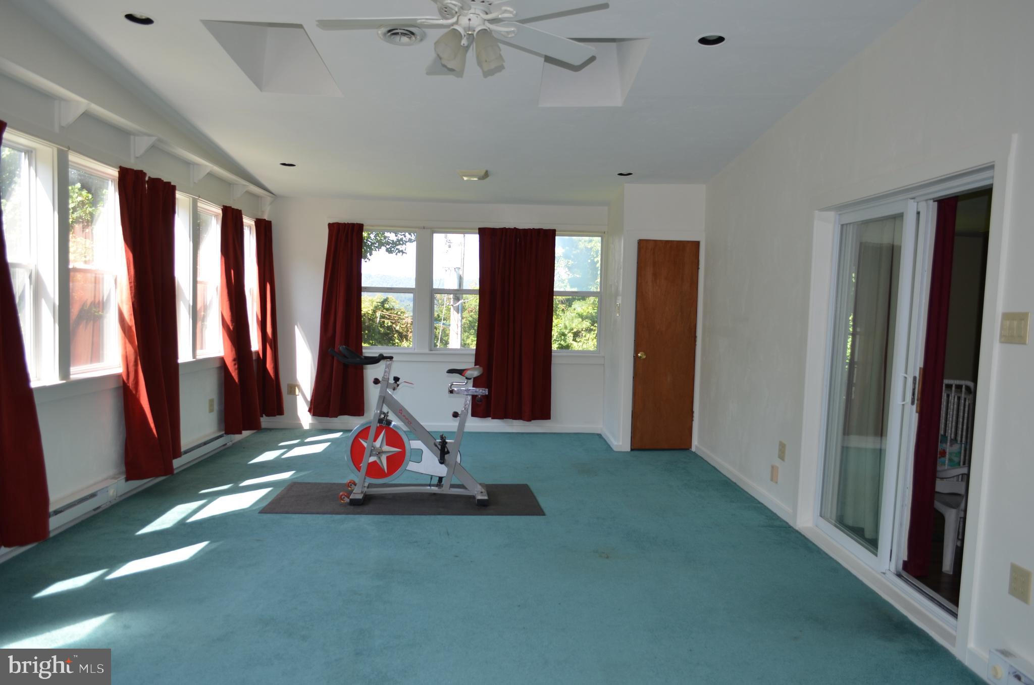 435 Big Spring Road New Cumberland, PA 17070 - Photo 29 of 79 2nd floor sunroom