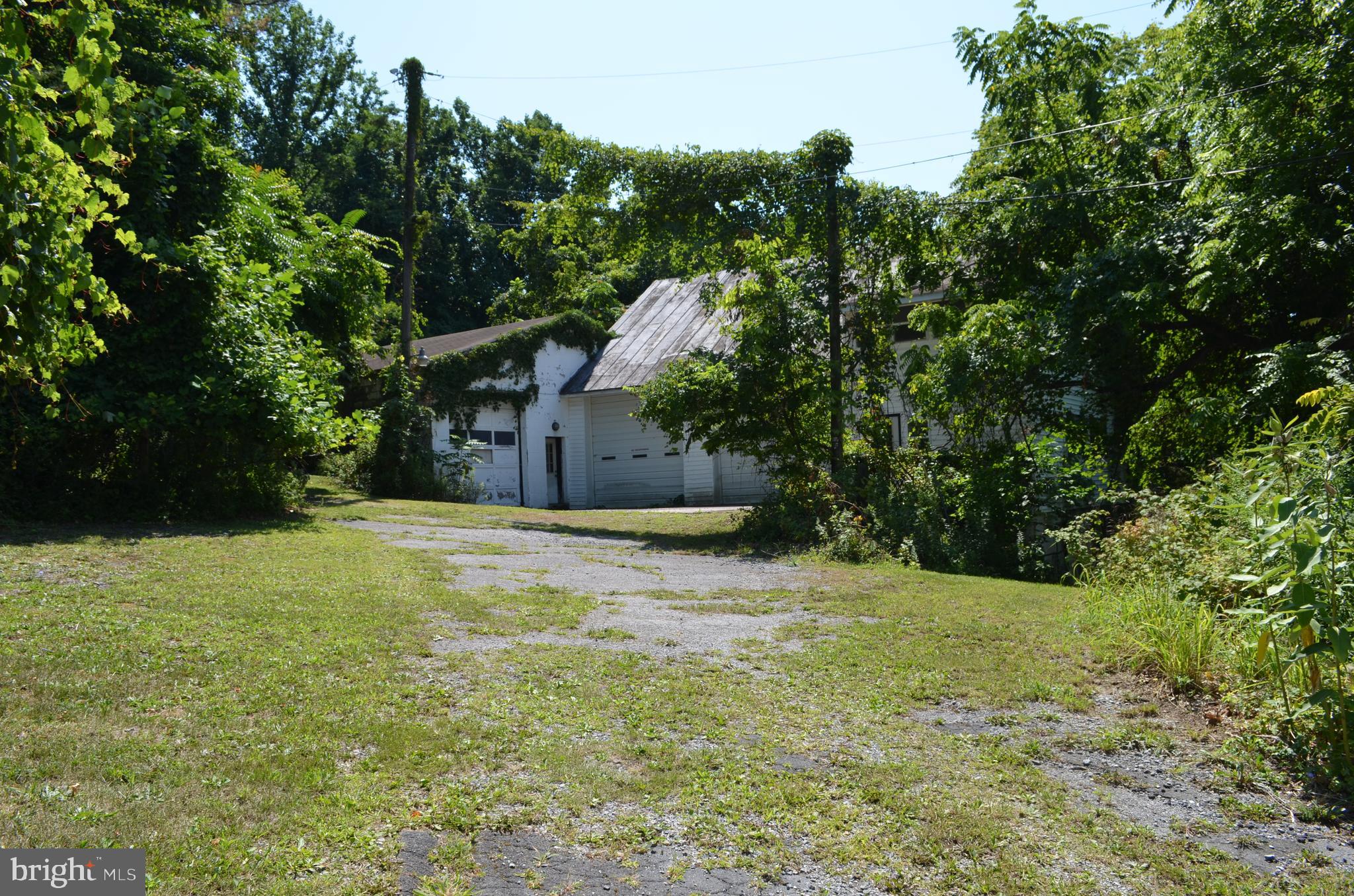 435 Big Spring Road New Cumberland, PA 17070 - Photo 69 of 79 View of barn/garage from Big Spring Rd