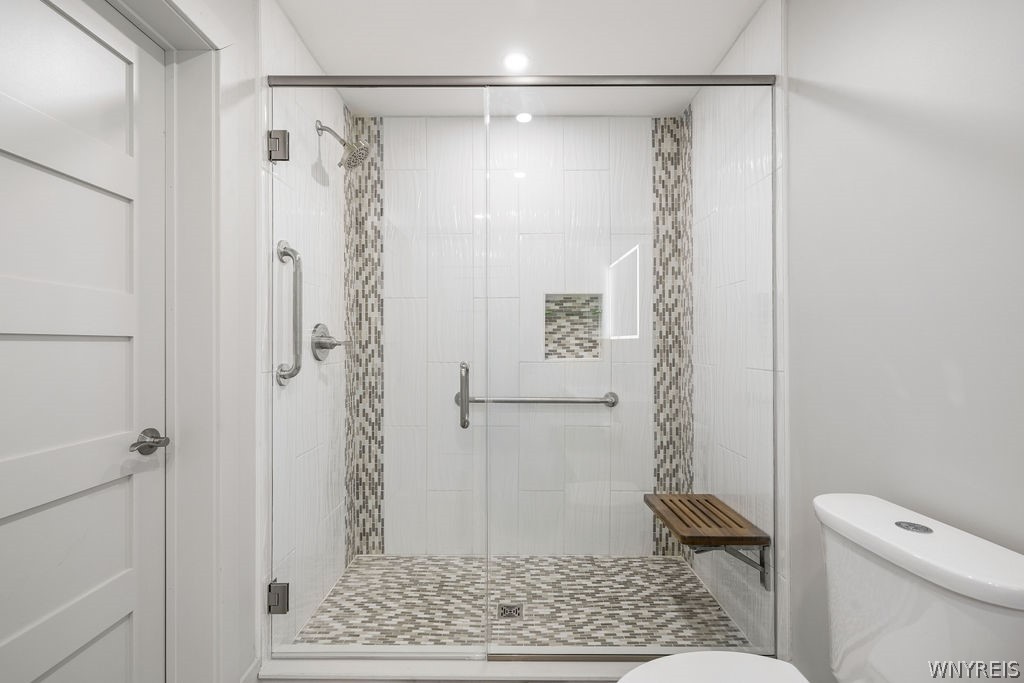 855 Madison Avenue Lewiston, NY 14092 - Photo 7 of 25 Primary bathroom with outstanding tile work, showe