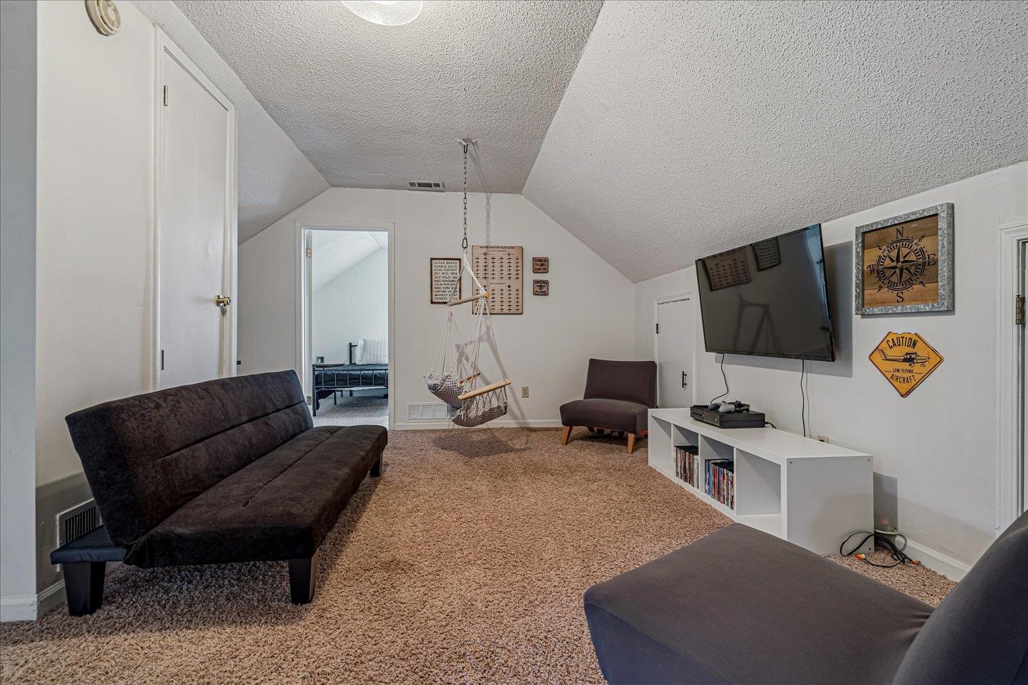 8379 Craven Road Bartlett, TN 38002 - Photo 26 of 40 a living room with furniture and a flat screen tv