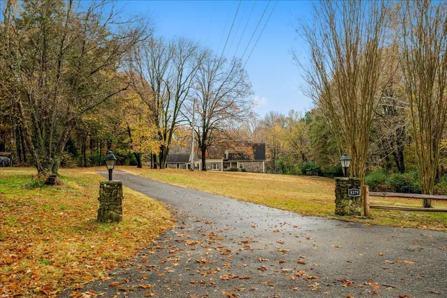 a building with trees in the background