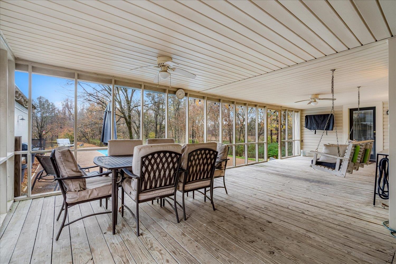 8379 Craven Road Bartlett, TN 38002 - Photo 31 of 40 a view of a patio with a table chairs and wooden floor