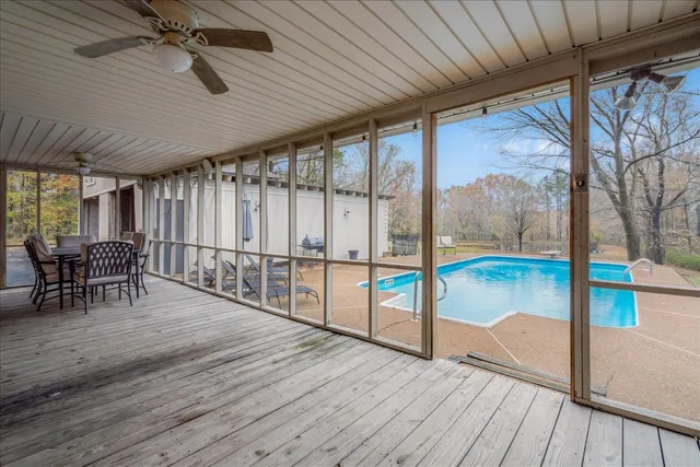 a view of a patio with wooden floor