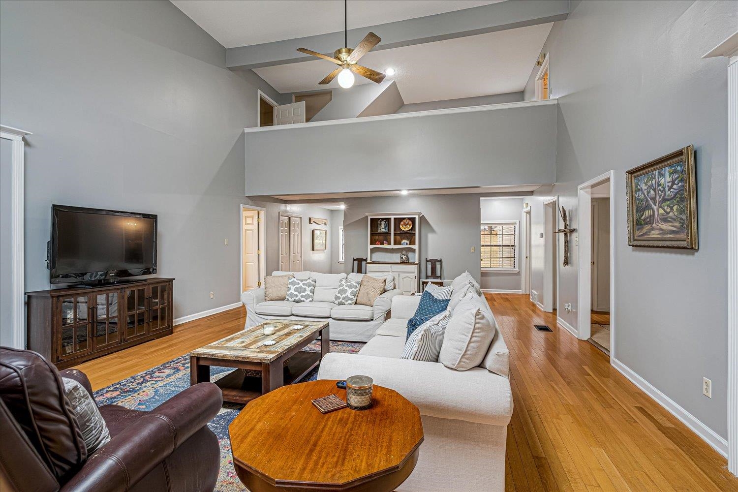 8379 Craven Road Bartlett, TN 38002 - Photo 9 of 40 a living room with furniture and a flat screen tv