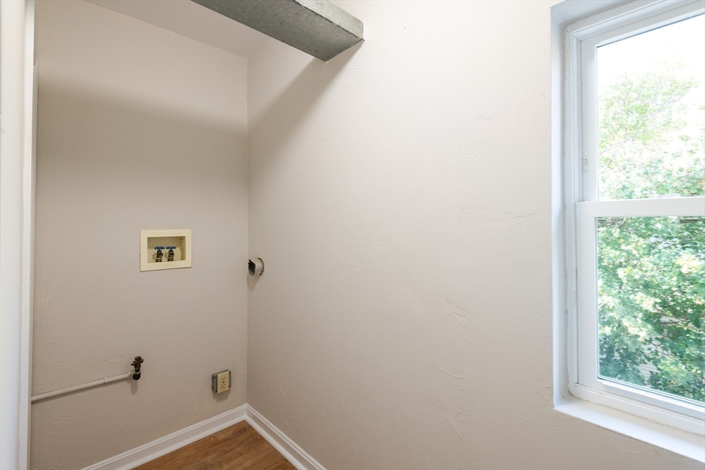 407 Washington Street, Unit 5 Boston, MA 02124 - Photo 22 of 24 a view of a small space with a window