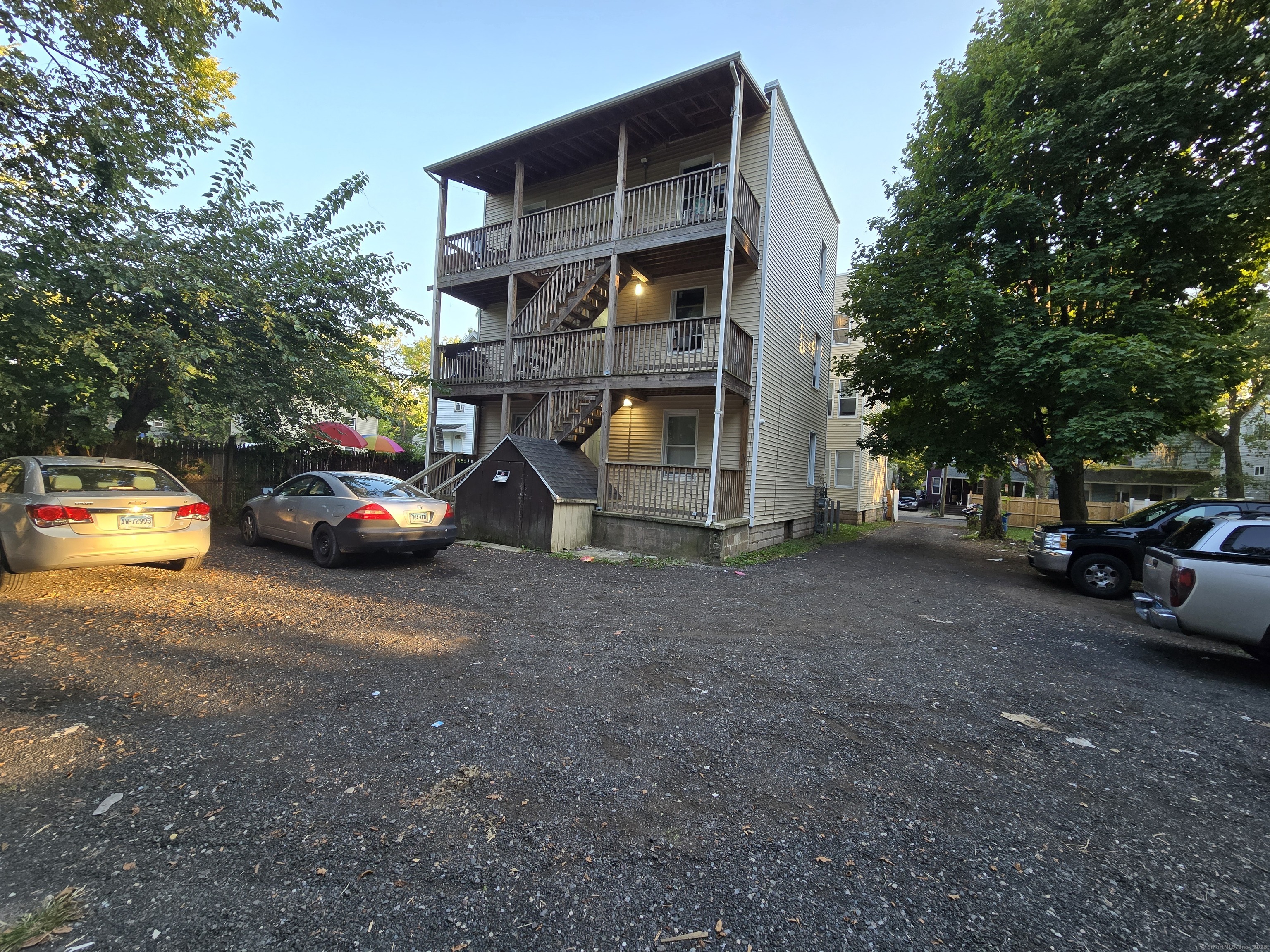 a view of car parked in front of house