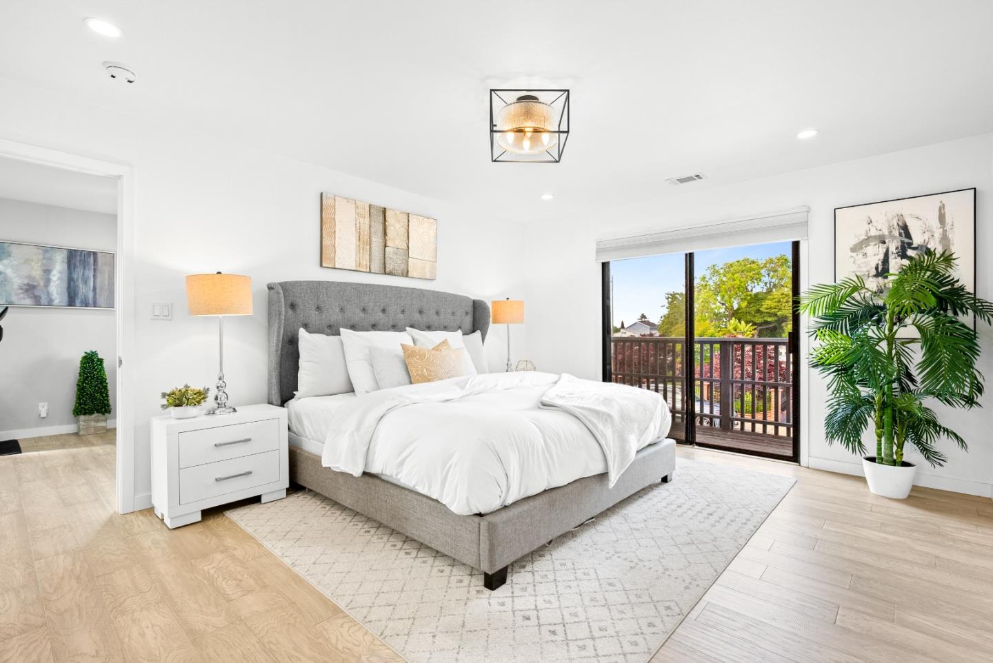 1776 Rex Street San Mateo, CA 94403 - Photo 12 of 46 a bedroom with a large bed and a large window