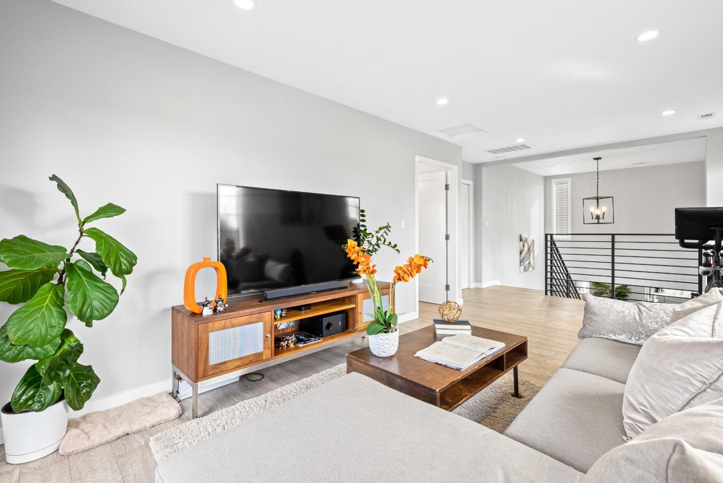 1776 Rex Street San Mateo, CA 94403 - Photo 17 of 46 a living room with furniture and a flat screen tv