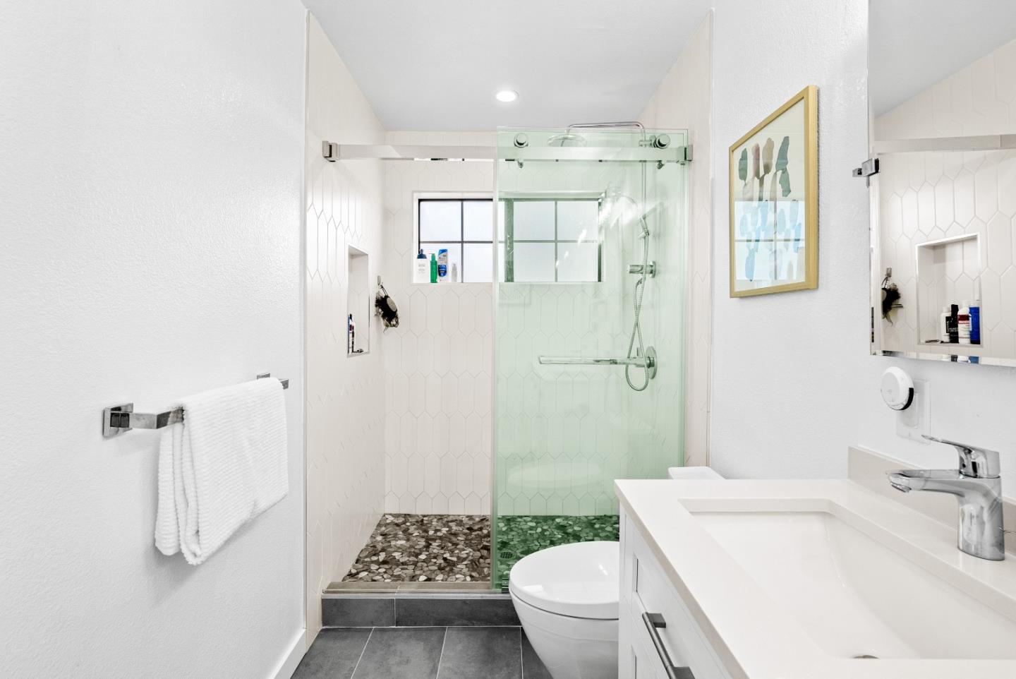 1776 Rex Street San Mateo, CA 94403 - Photo 20 of 46 a bathroom with a sink toilet and shower