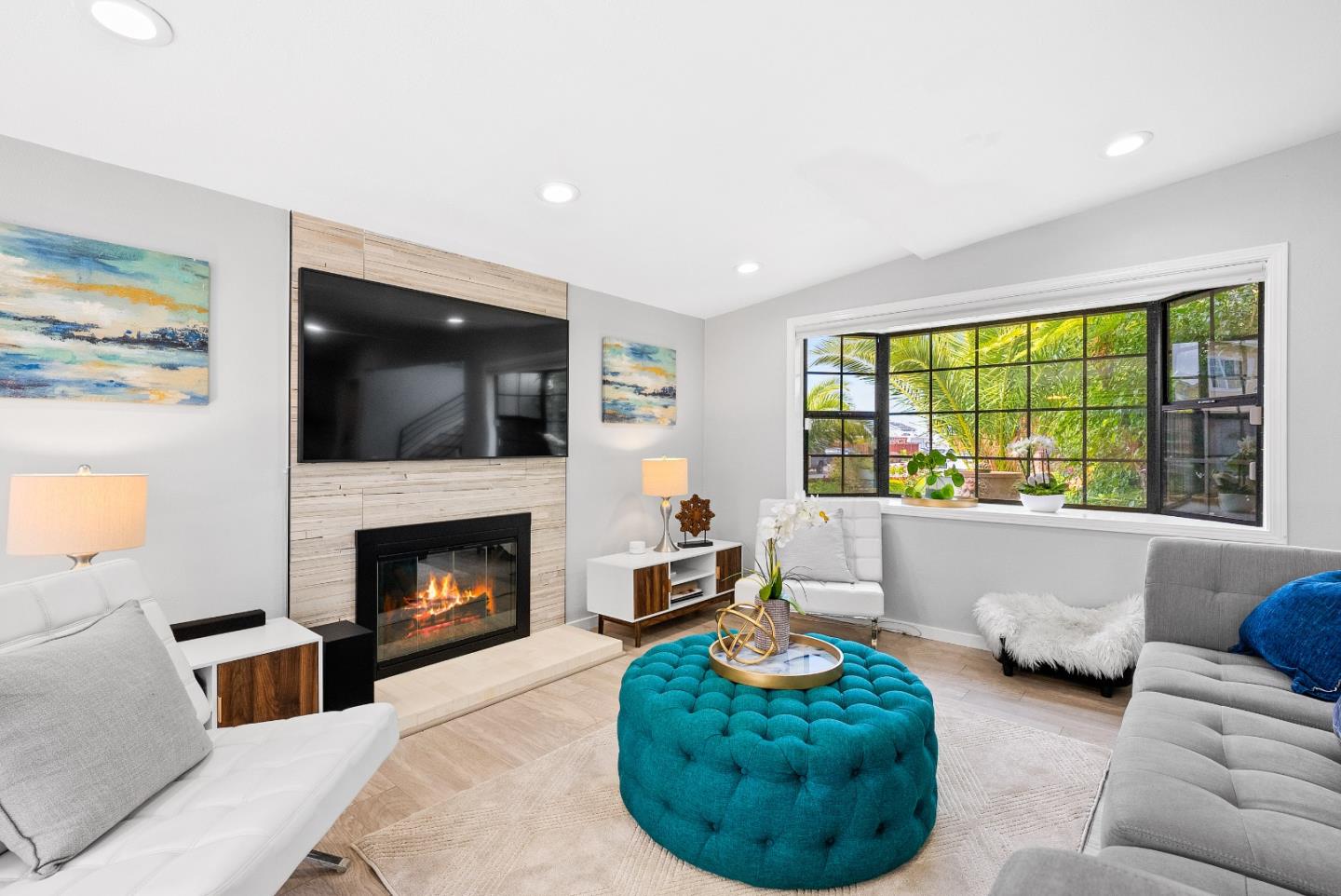 1776 Rex Street San Mateo, CA 94403 - Photo 7 of 46 a living room with furniture a flat screen tv and a fireplace