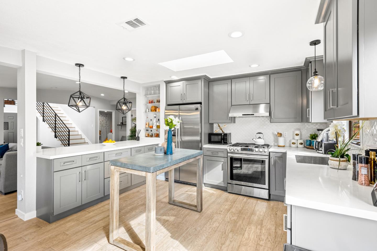 1776 Rex Street San Mateo, CA 94403 - Photo 9 of 46 a kitchen with a sink cabinets and window