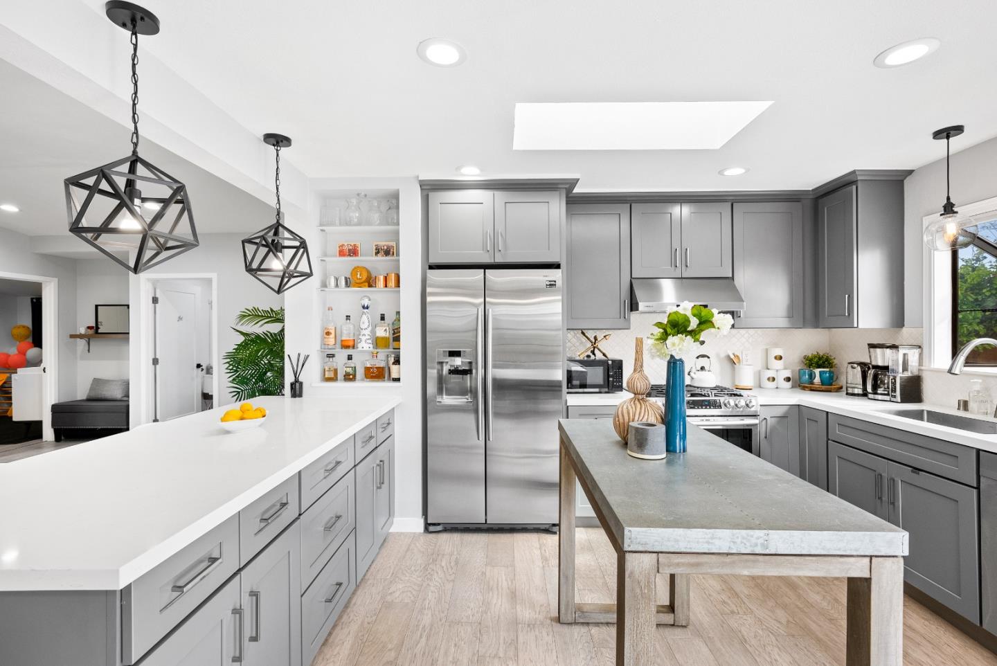 1776 Rex Street San Mateo, CA 94403 - Photo 10 of 46 a kitchen that has a lot of cabinets a sink and a refrigerator