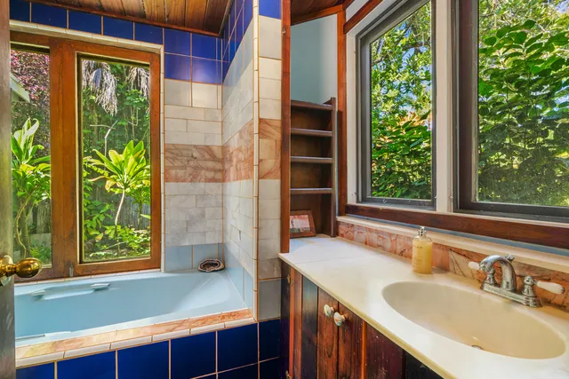 a view of an chairs and table in the balcony