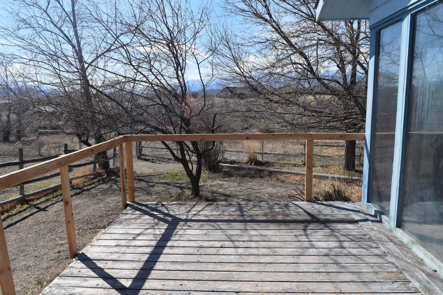 113 Fox Run Road Rifle, CO 81650 - Photo 23 of 30 a view of wooden deck