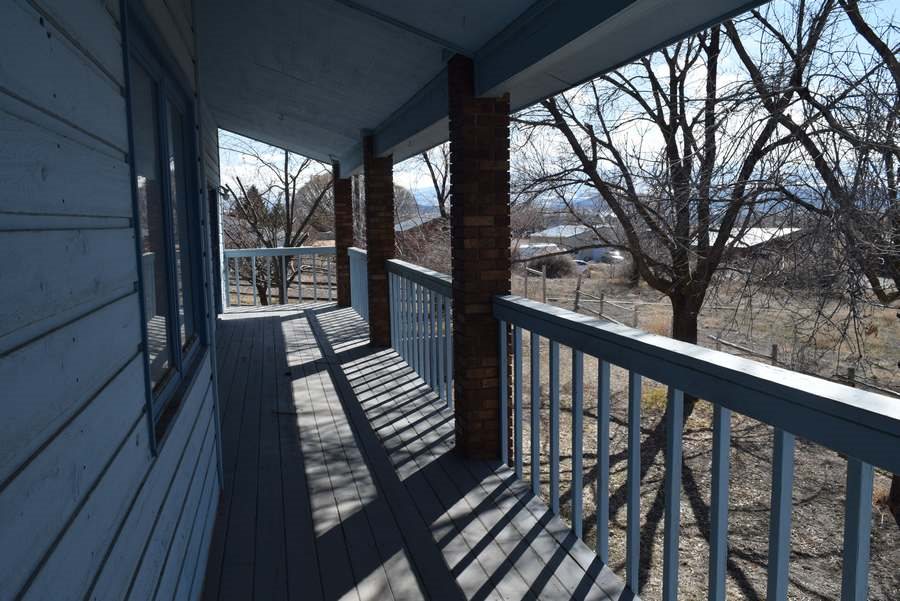 113 Fox Run Road Rifle, CO 81650 - Photo 9 of 30 a view of balcony with wooden floor
