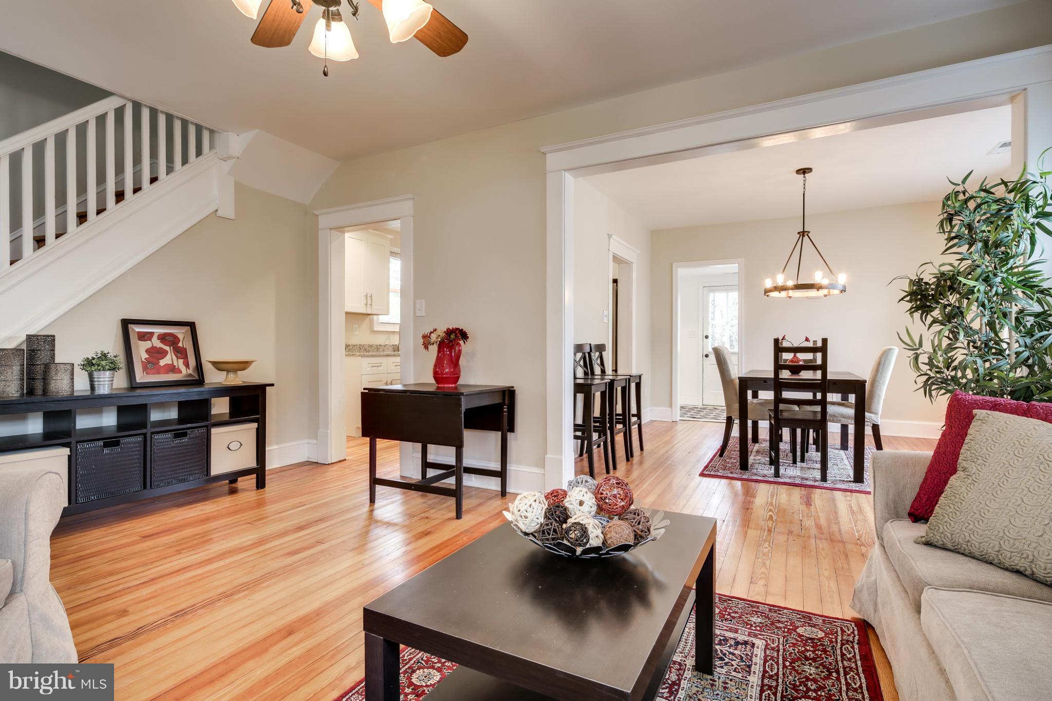 3202 Grace Road Baltimore, MD 21219 - Photo 1 of 29 a living room with furniture and wooden floor