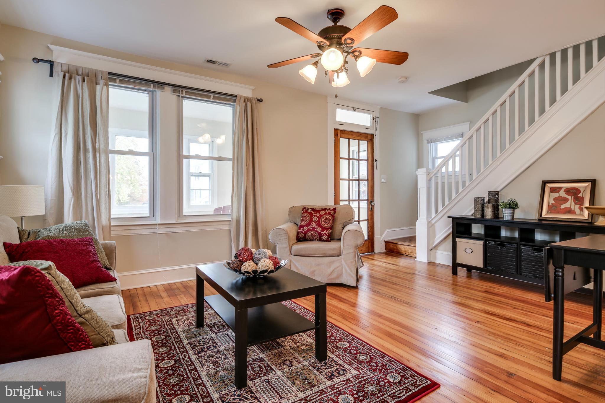 3202 Grace Road Baltimore, MD 21219 - Photo 2 of 29 a living room with furniture and a window