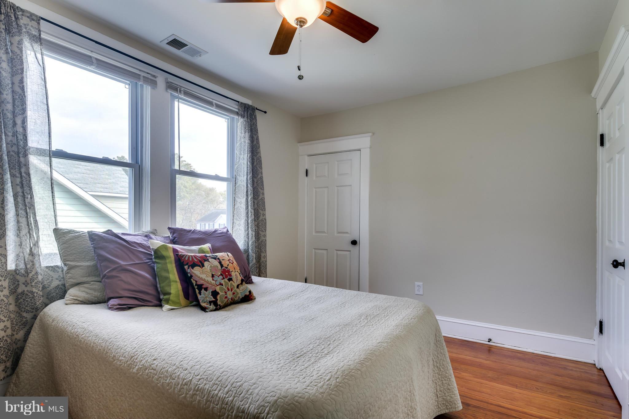 3202 Grace Road Baltimore, MD 21219 - Photo 15 of 29 a bedroom with a bed and window