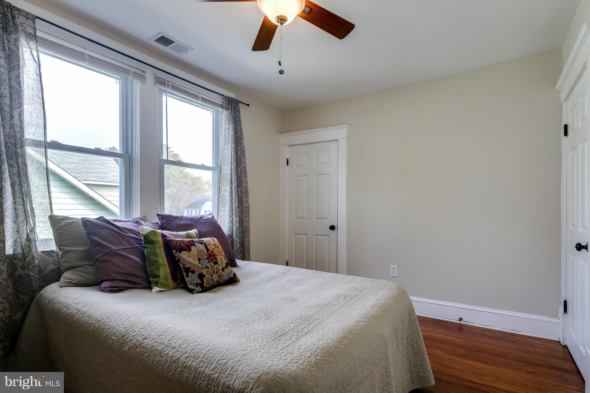 3202 Grace Road Baltimore, MD 21219 - Photo 17 of 29 a bedroom with a bed and window