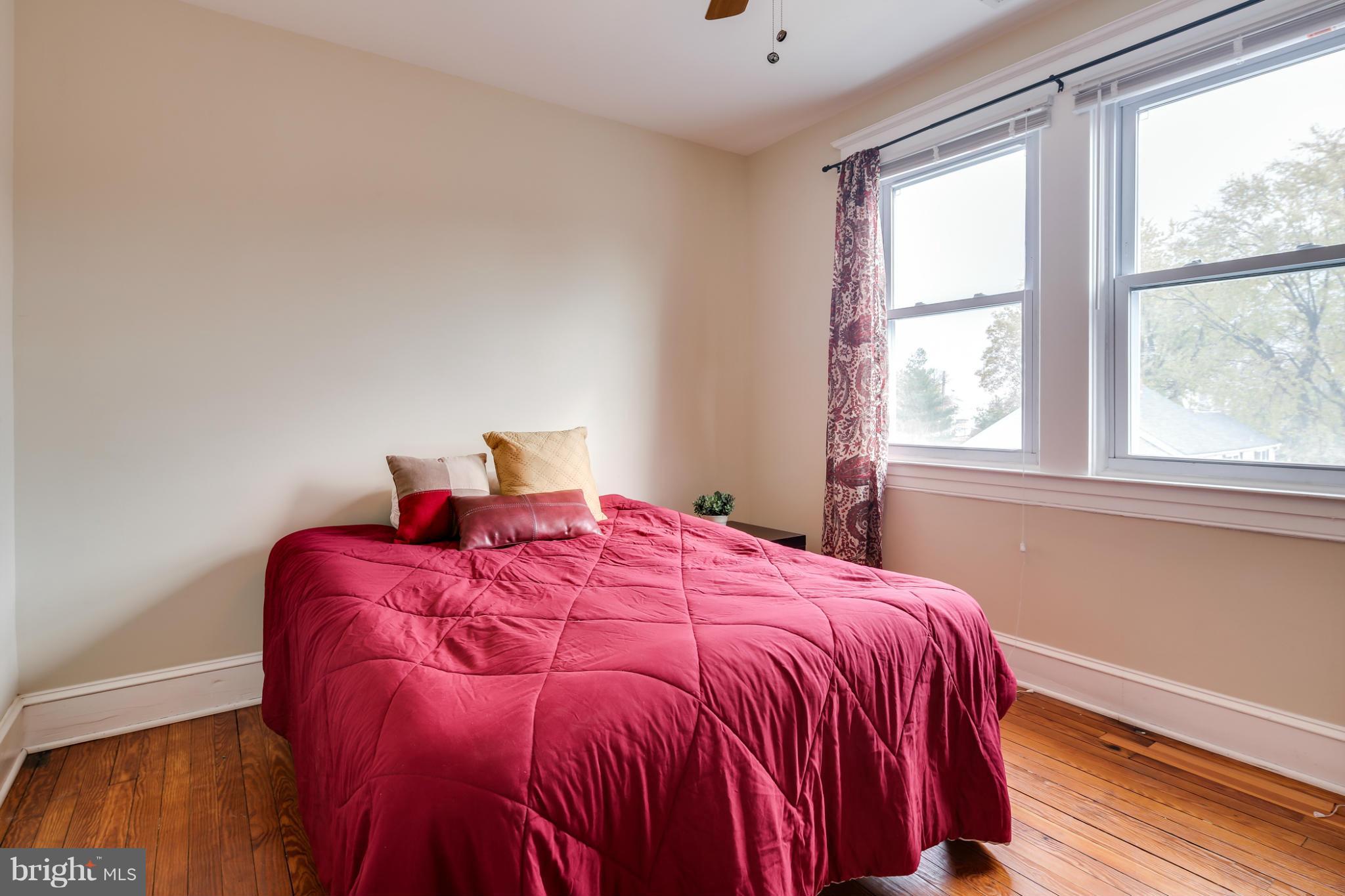 3202 Grace Road Baltimore, MD 21219 - Photo 18 of 29 a bedroom with a bed and a window