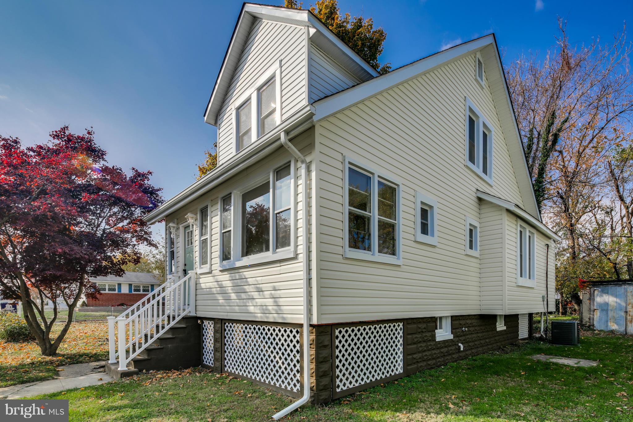 3202 Grace Road Baltimore, MD 21219 - Photo 27 of 29 a view of a house with a yard