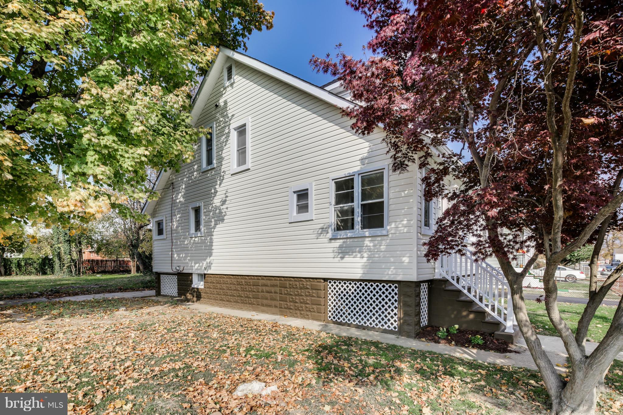 3202 Grace Road Baltimore, MD 21219 - Photo 29 of 29 a view of a house with a yard