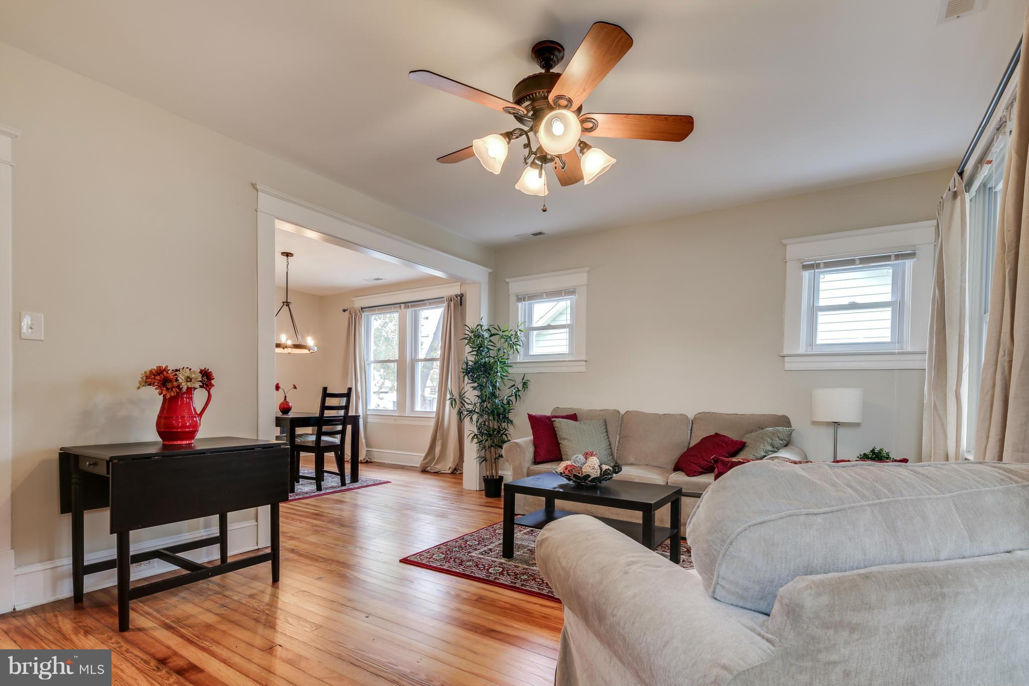3202 Grace Road Baltimore, MD 21219 - Photo 7 of 29 a living room with furniture and wooden floor