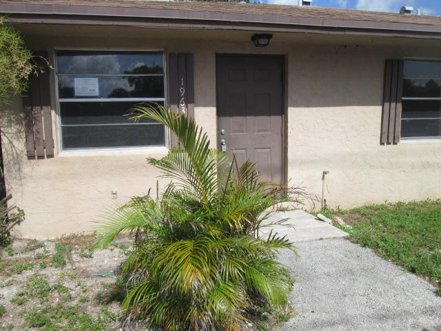 1963 Tucker Road, Unit 1963 Palm Springs, FL 33406 - Photo 1 of 7 IMG_0830