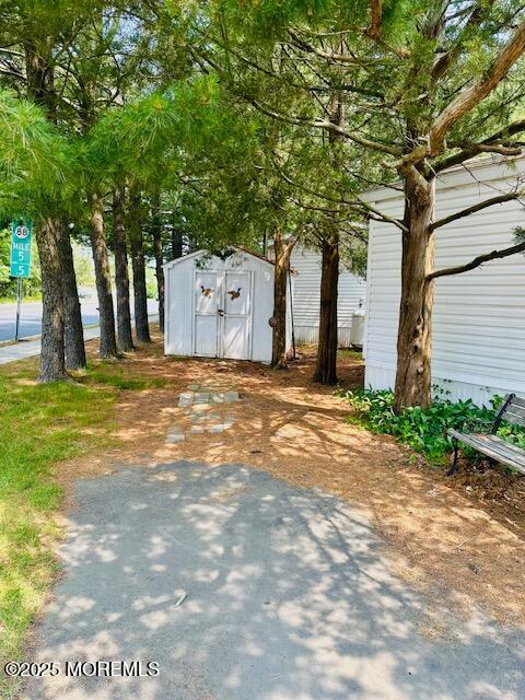 11 B Trail Brick, NJ 08724 - Photo 18 of 24 Driveway and shed